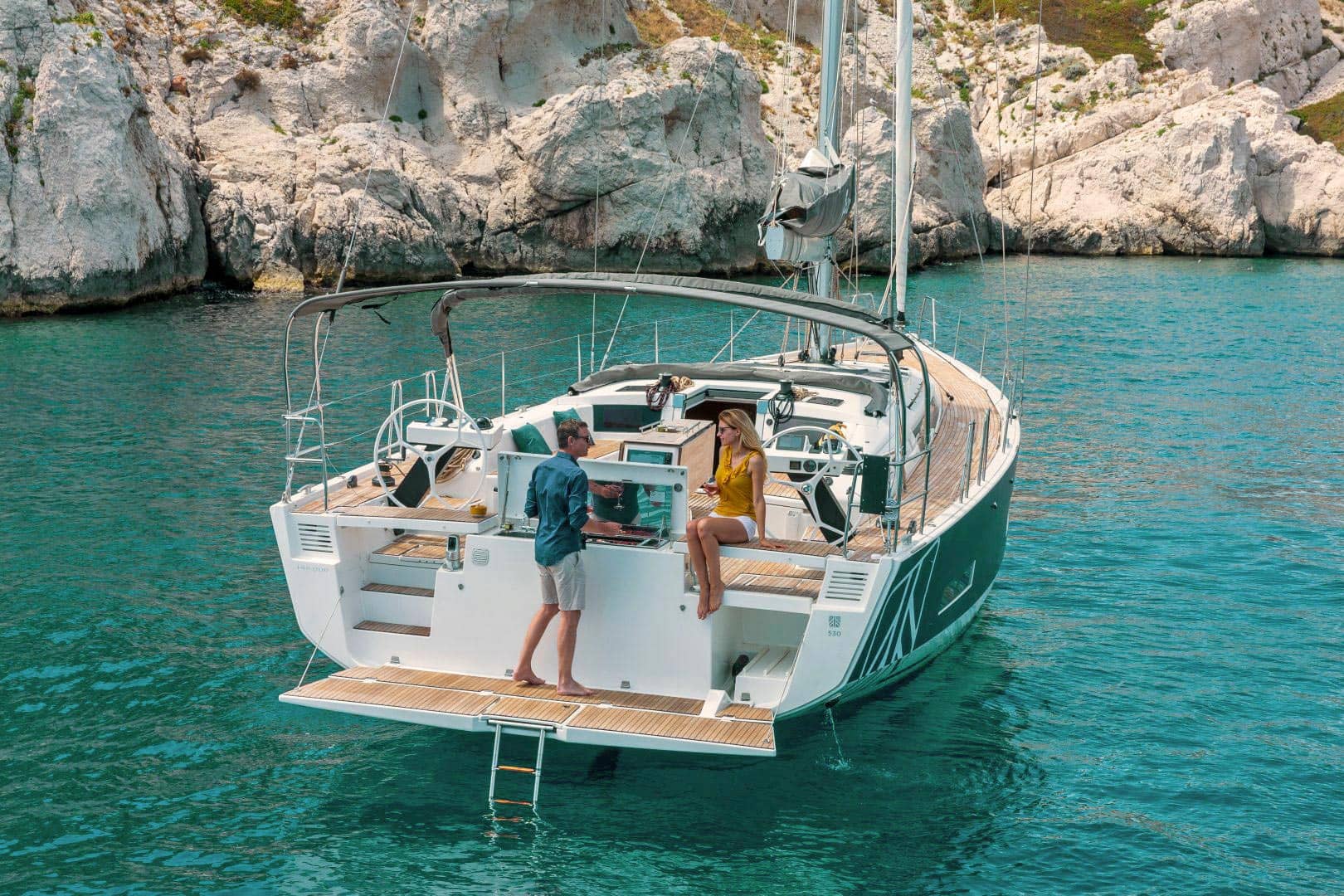 Couple on board a Dufour 530 yacht