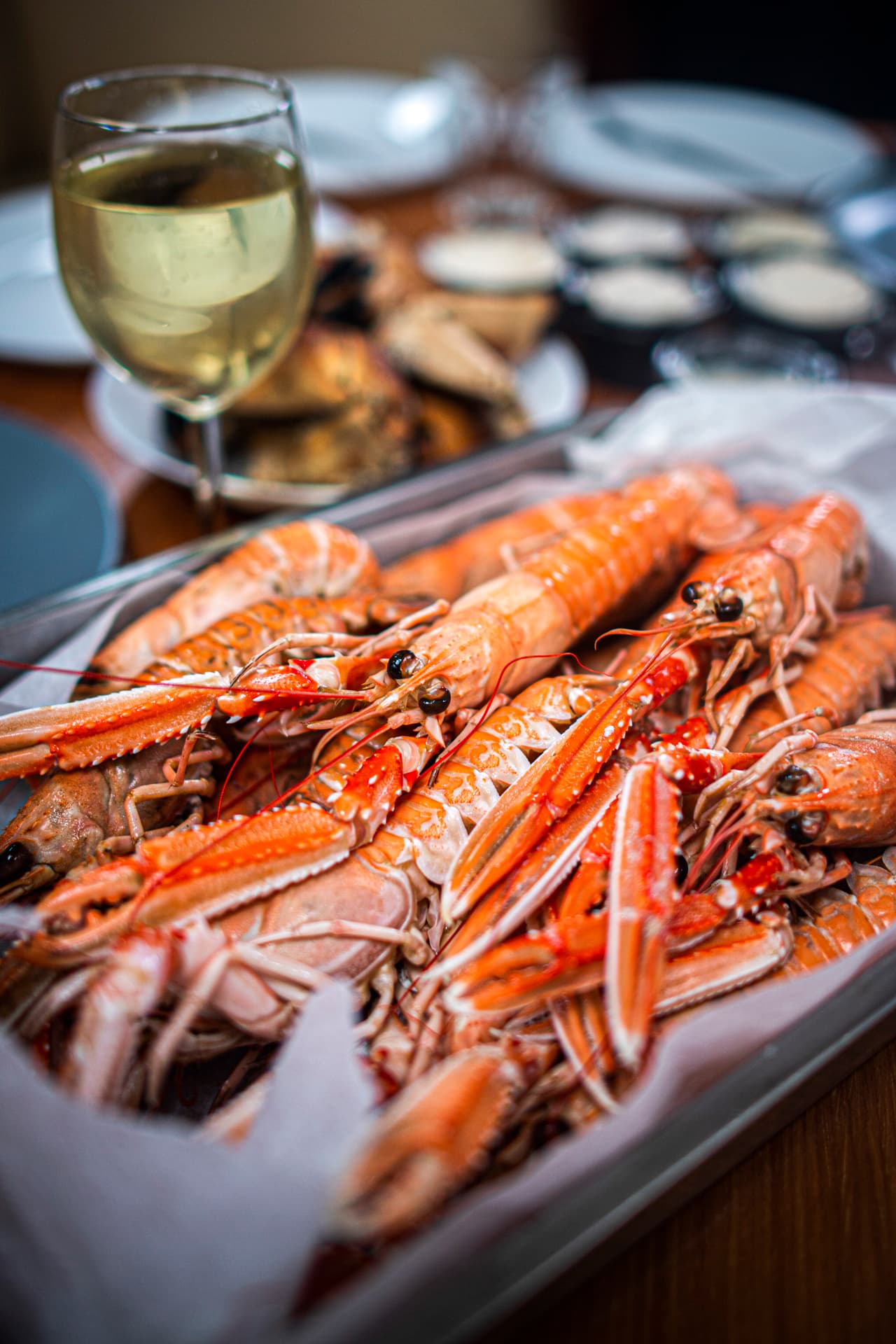 Boiled crayfish and a glass of white wine