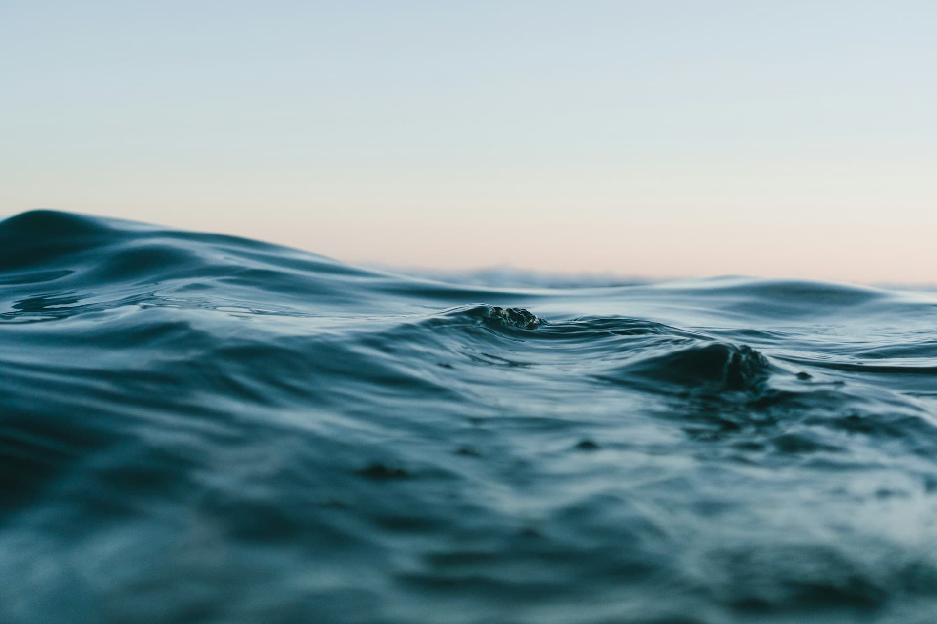 Close-up of waves at sunrise.