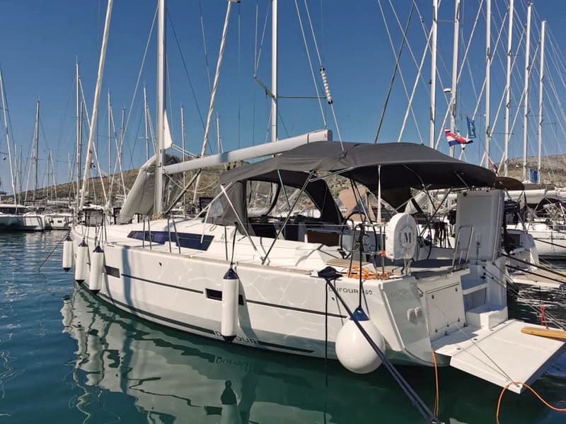 The Dufour 460 monohull moored in a harbour. 